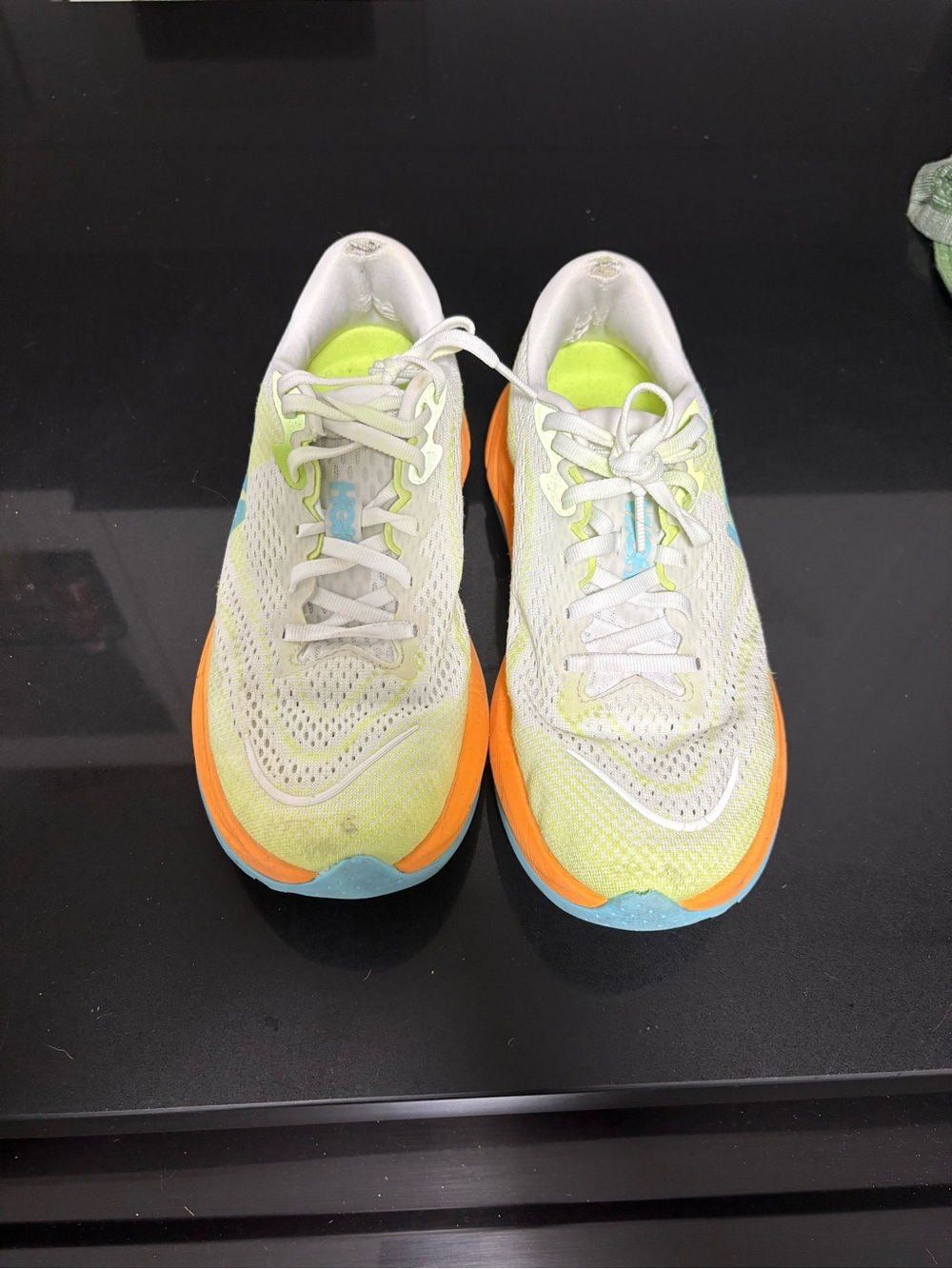 Hoka One One Neon Yellow Running Shoes with Orange and Blue Accents